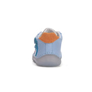 child wearing barefoot shoes outdoors UK